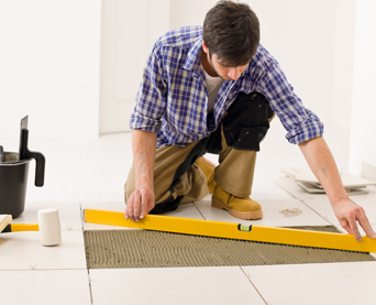 Handyman with spirit level